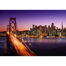Fotobehang van de Oakland Bay Bridge in San Francisco, prachtig verlicht tegen een nachtelijke skyline.