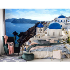 Een fotobehang van Santorini met een rustgevende uitstraling in een slaapkamer.