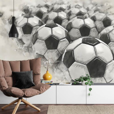 Een fotobehang met een schildering van voetballen in een woonkamer.