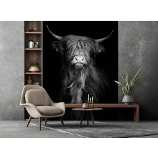 Een fotobehang met een uniek patroon van een Schotse hooglander in een woonkamer.