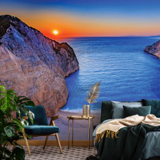 Een fotobehang van Shipwreck Beach op Zakynthos met een scheepswrak op het strand in Griekenland.