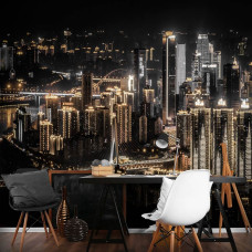 Een fotobehang van een stad in de nacht voor het kantoor.