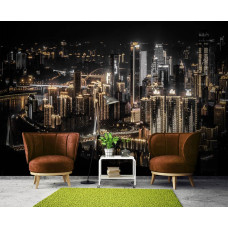 Een fotobehang van een stad in de nacht voor de woonkamer.