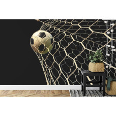 Een fotobehang met een speelse weergave van een voetbal strak in het net in een kinderkamer.