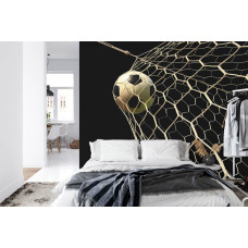 Een fotobehang met een speelse weergave van een voetbal strak in het net in een slaapkamer.