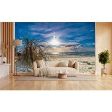 Fotobehang met strand, zee en helmgras in de zon in de woonkamer.