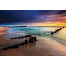 Zonsondergang op het strand, kleurrijk fotobehang met een prachtige horizon en zeezicht.