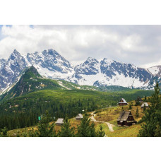 Tatra-gebergte met besneeuwde toppen en uitgestrekt landschap op fotobehang.