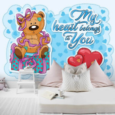 Een fotobehang van een teddybeer met hart en tekst cadeau voor de kinderkamer en babykamer.