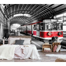 Een fotobehang met een treinstation voor de slaapkamer.