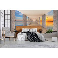 Een fotobehang met uitzicht op het meer bij zonsondergang in de slaapkamer.