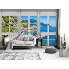 Fotobehang met uitzicht op stad en zee in 3D door een raam, geschikt voor de woonkamer.