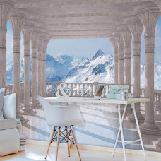 Een fotobehang van de besneeuwde bergen in een kantooromgeving.