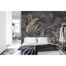 Een fotobehang met bladeren en jungleplanten, afgebeeld in een slaapkamer.