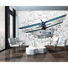 Een fotobehang met vliegtuigen door een bakstenen muur met 3D-effecten voor de woonkamer.