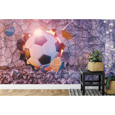 Een fotobehang met een 3D-afbeelding van een voetbal die uit een muur lijkt te breken in een kinderkamer.