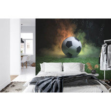 Een fotobehang met een magische voetbal in een abstracte stijl in een slaapkamer.