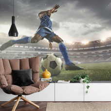 Een fotobehang met een voetballer in actie in een stadion in een woonkamer.