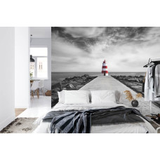 Een fotobehang met een vuurtoren op een strand in Praia da Rocha, Algarve, perfect voor een slaapkamer.
