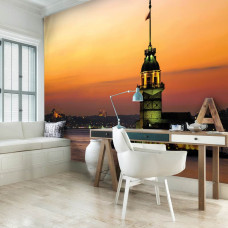 Een fotobehang van de vuurtoren in Istanboel voor het kantoor.