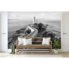 Een fotobehang van een vuurtoren aan de zee met een landschap voor de huiskamer.