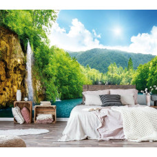 Een fotobehang van een waterval in een serene natuurlijke omgeving, passend voor de slaapkamer.