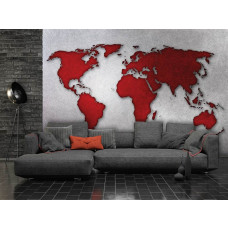 Een fotobehang van een wereldkaart op een betonnen achtergrond, geschikt voor een woonkamer.
