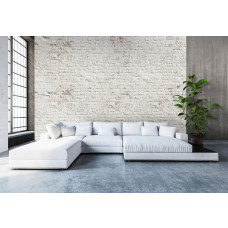 Een fotobehang met een witte bakstenen muur in een industrieel ontwerp, perfect voor een woonkamer.