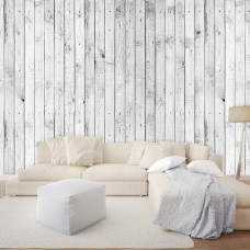 Een fotobehang van witte houten planken met een subtiele bruine achtergrond, geschikt voor een woonkamer of keuken.