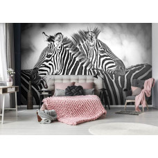 Een fotobehang met zebra's in zwart-wit, passend voor de slaapkamer.