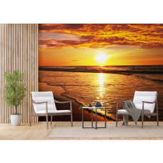 Een bedrijfsruimte met een fotobehang van een zonsondergang aan het strand boven zee.