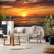 Een fotobehang van zonsondergang aan zee met natuur landschap in de huiskamer.
