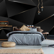 Een fotobehang met zwarte 3D-geometrische driehoeken en gouden randen te zien in de slaapkamer.