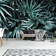 Een fotobehang van jungle bladeren in een natuurlijke omgeving voor de woonkamer.