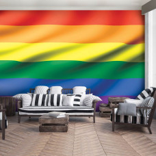 Een fotobehang met de regenboogvlag voor de woonkamer.