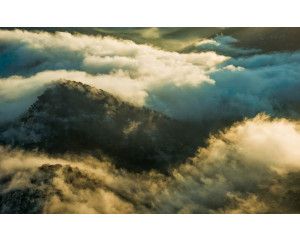 Cap de Formentor fotobehang met wolken en uitzicht op Mallorca.