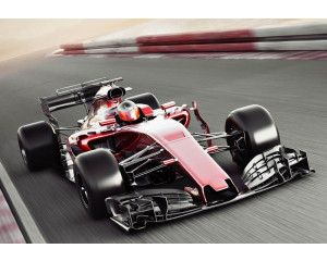 Fotobehang van een Formule 1 auto in actie op een rood circuit, voor een krachtige race-ervaring.