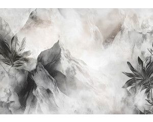 Fotobehang met een mistig berglandschap op de achtergrond en tropische bladeren op de voorgrond.