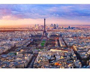 Fotobehang van een zonsondergang in Parijs met de Eiffeltoren.