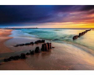 Zonsondergang op het strand, kleurrijk fotobehang met een prachtige horizon en zeezicht.