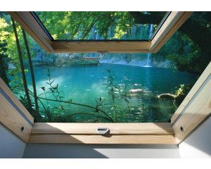 Fotobehang met uitzicht op een tropische jungle en waterval, zichtbaar door een raam, 3D-effect.