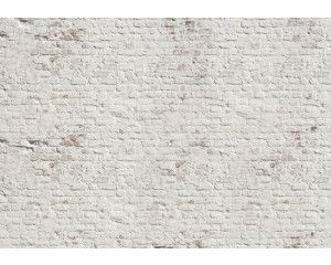 Witte bakstenen muur, met een authentieke en realistische textuur, ideaal voor industriële ruimtes op dit fotobehang.