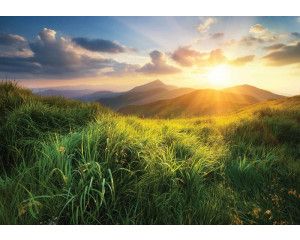 Fotobehang van een zonsondergang in de natuur, met een prachtig berglandschap.