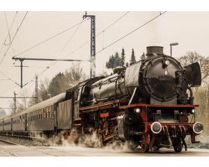 Fotobehang van een stoomlocomotief trein, robuust en klassiek.