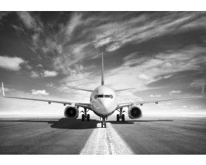 Zwart-wit fotobehang van een vliegtuig, stijlvol en tijdloos.